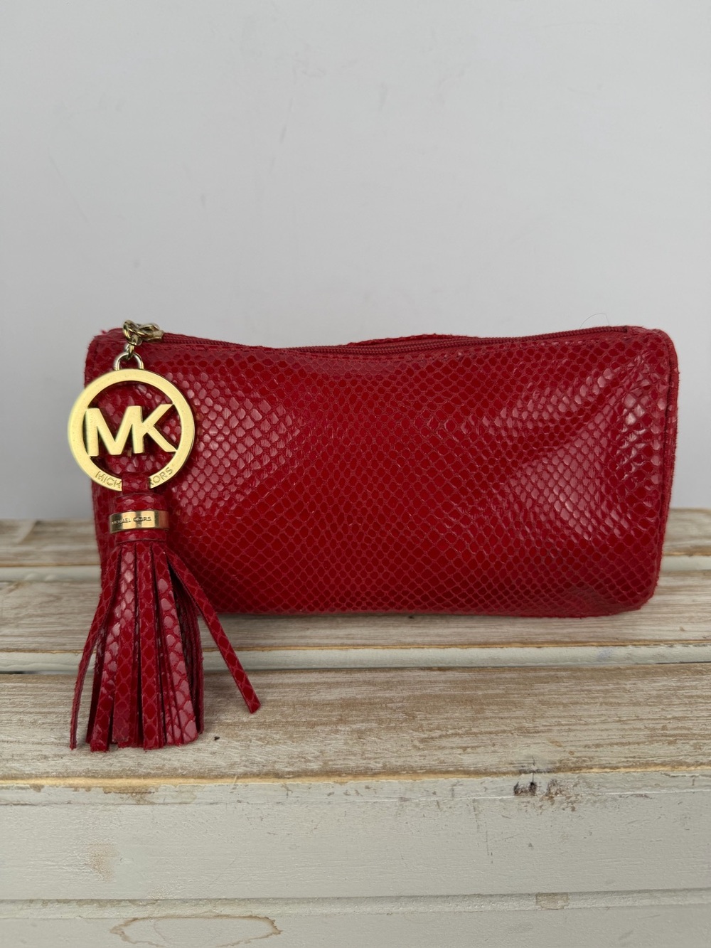 Michael Kors vibrant red textured cosmetic make pouch bag